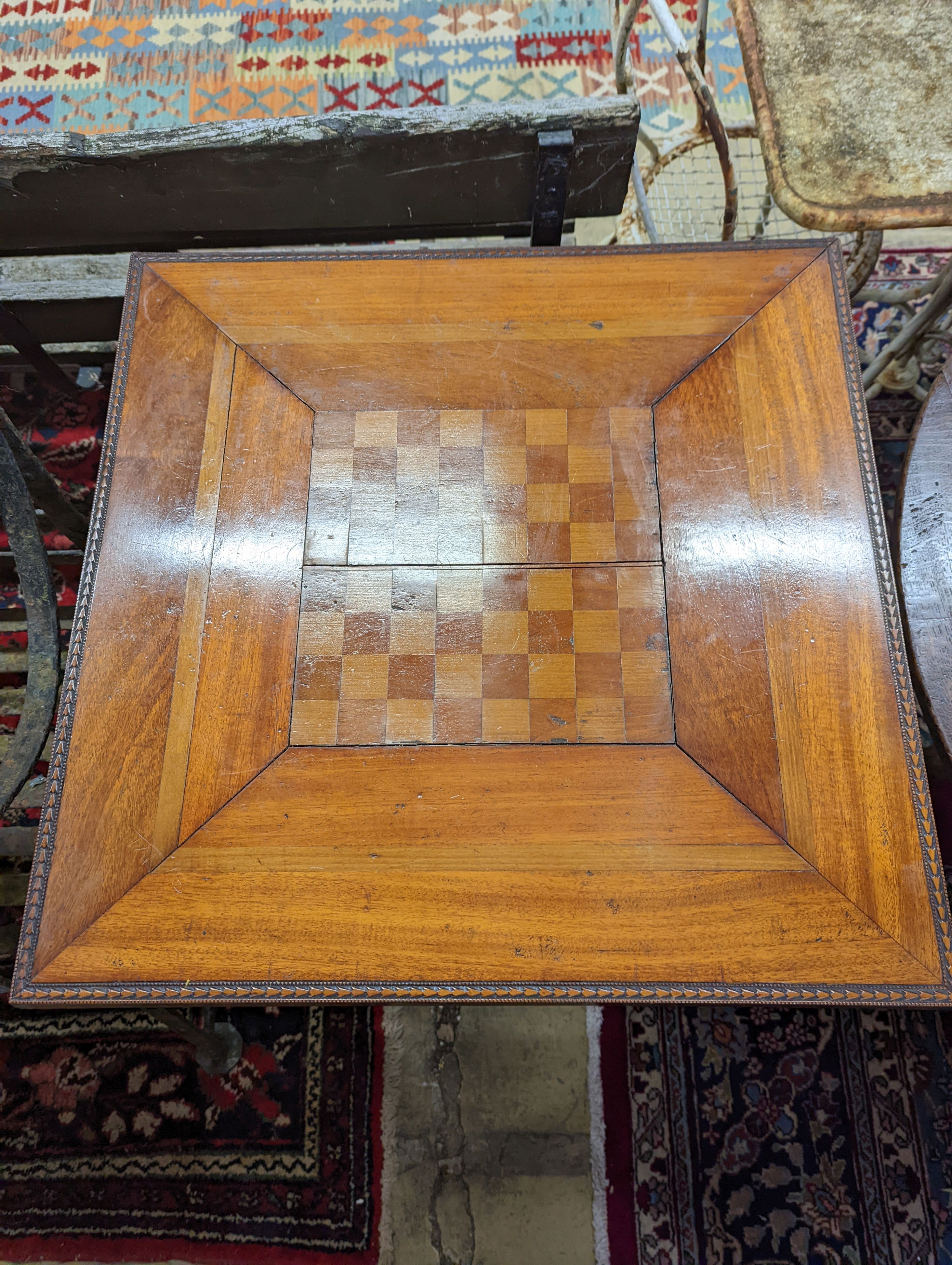 An early 20th century French inlaid games table, width 61cm, depth 61cm, height 7cm